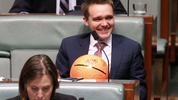 Liberal MP Wyatt Roy with Bert van Manen's ball in question time on Tuesday.