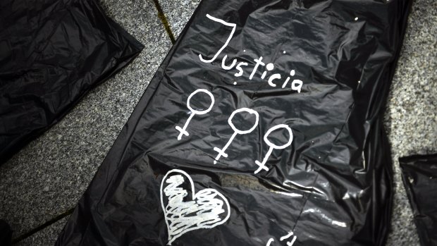 A plastic black bag painted with the word, ''Justice'' during a protest against sexual abuse in Pamplona, northern Spain.