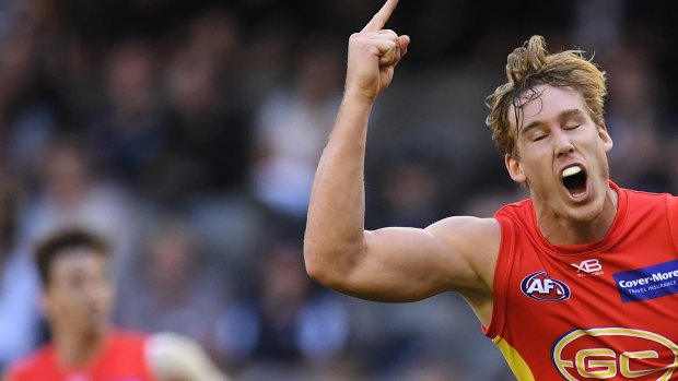 Sun shines: Tom Lynch kicked a bag of eight for Gold Coast against Carlton.