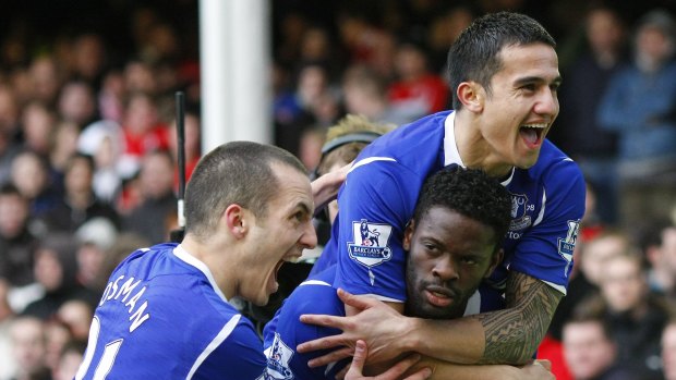 Everton's Louis Saha (bottomR) celebrates with Tim Cahill (top R) and Leon Osman after scoring during their FA Cup quarter-final in 2009.
