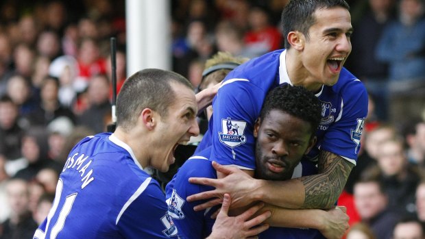 Everton's Louis Saha (bottomR) celebrates with Tim Cahill (top R) and Leon Osman after scoring during their FA Cup quarter-final in 2009.