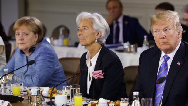 Angela Merkel, IMF chief Christine Lagarde and Donald Trump