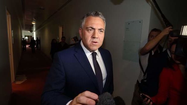 Treasurer Joe Hockey departs the press gallery after a television interview on Sunday. Photo: Andrew Meares