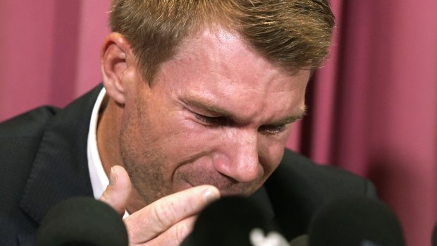 David Warner struggles to contain his emotions.