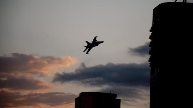 Hornet jets fly past the CBD.