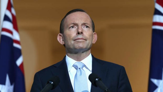 Prime Minister Tony Abbott addresses the media on Friday. Photo: Alex Ellinghausen