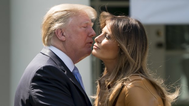 President Donald Trump kissed his wife on the cheeks five times after her presentation.