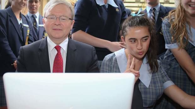 Georgie Hayes sneaks a laptop selfie with Labor leader Kevin Rudd at St Columan's College in Caboolture on Monday.