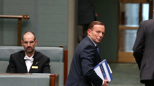 Prime Minister Tony Abbott departs question time on Wednesday.