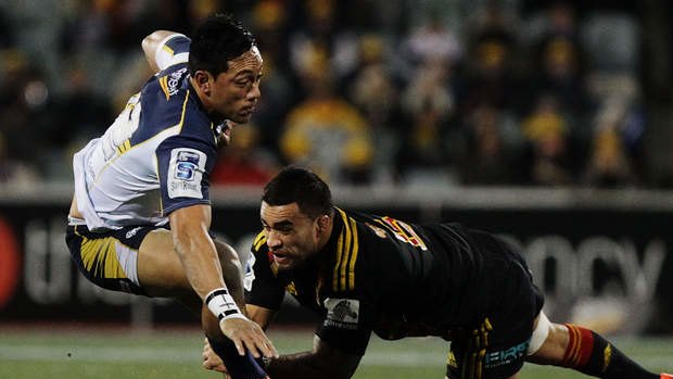Christian Lealiifano of the Brumbies is tackled during the playoff clash with the Chiefs at GIO Stadium in Canberra.
