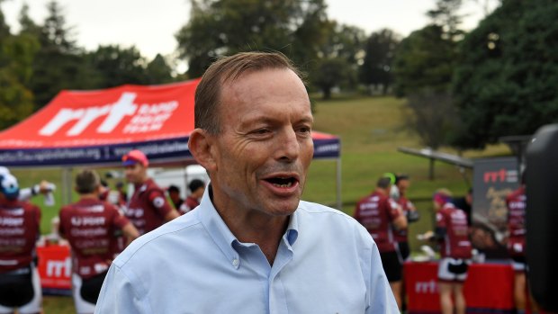Former prime minister Tony Abbott speaks to the media at Warragul before taking part in the Pollie Pedal through Gippsland, Victoria, on Monday.