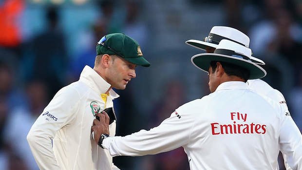 Australia captain Michael Clarke of remonstrates with umpire Aleem Dar late on the final day of the fifth Ashes Test just just before the match was halted - and ended - due to bad light.