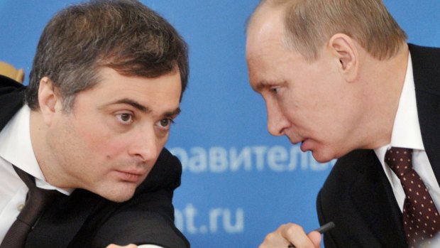 Russian Prime Minister Vladimir Putin, right, speaks to Vladislav Surkov, in 2012. 