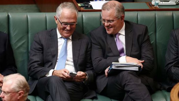 Communications Minister Malcolm Turnbull and Immigration Minister Scott Morrison during Question Time. Photo: Alex Ellinghausen