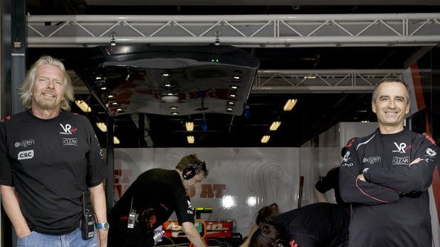 Sir Richard Branson and John Borghetti with the Virgin Racing Formula One car.