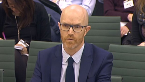 Simon Milner, Policy Director for the UK, Middle East and Africa for Facebook in front of the Home Affairs Select Committee in the House of Commons, London