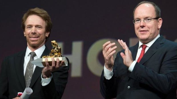 Prince Albert II of Monaco, right, presents the Crystal Nymph to producer Jerry Bruckheimer at the Monte Carlo Television Festival.