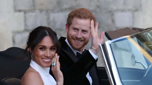 The newly married Duke and Duchess of Sussex on their way to the "reception".