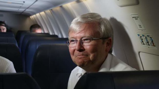 Prime Minister Kevin Rudd on the plane from Darwin  on Wednesday.