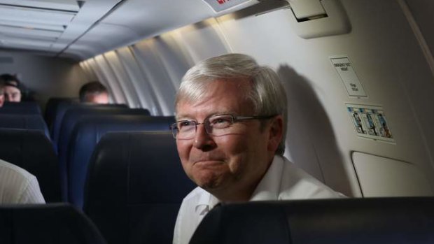 Prime Minister Kevin Rudd on the plane from Darwin  on Wednesday.