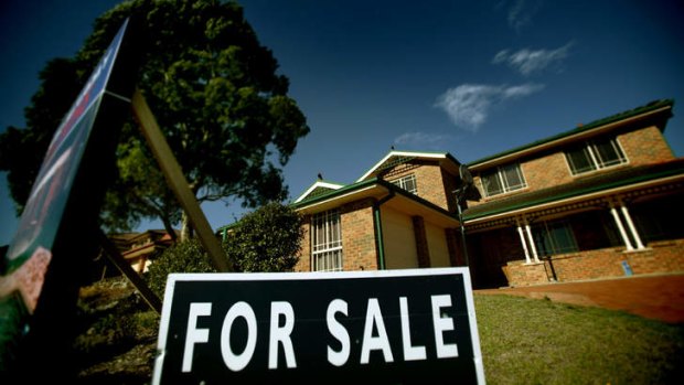 The house price slump is being caused by tighter access to credit, economists say.
