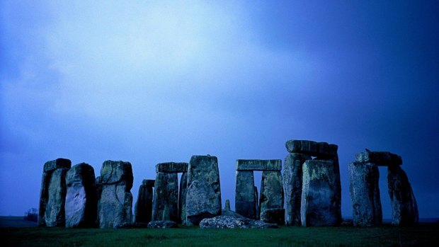 The megalithic ruin known as Stonehenge stands on the open downland of Salisbury Plain.