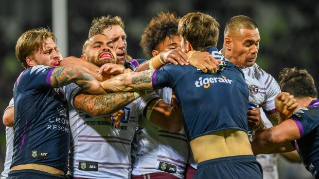 Repercussions: Storm and Manly players clash in Melbourne before Curtis Scott is shown a red card.