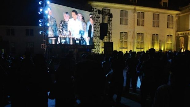 Fiesta: Crowds gather in Jakarta’s colonial-era city square to hear Jokowi speak.