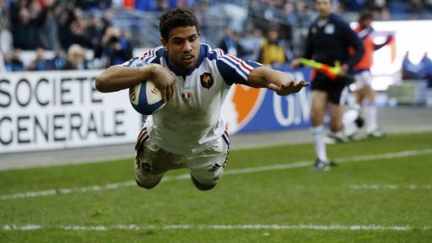 France's Wesley Fofana scores a try against Italy during their Six Nations rugby union match.