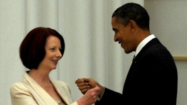 Meeting of the minds ... Julia Gillard and Barack Obama chat before the Leaders' Declaration at the APEC Summit.