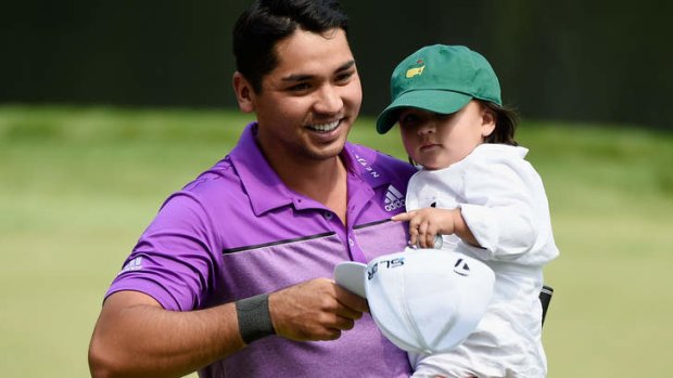 Day with his son Dash at Augusta.