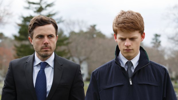 Lee Chandler (Casey Affleck, left) and his nephew Patrick (Lucas Hedges) in <i>Manchester by the Sea</i>.
