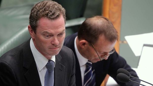 Altered his account ... Christopher Pyne, left, pictured here with Tony Abbott.