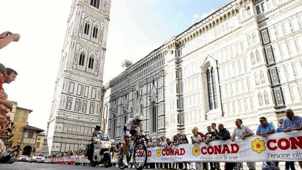 World champion Tony Martin rides past the Duomo in Florence.