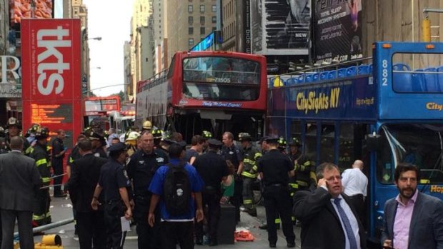 15 people were injured after a CitySights bus slammed into a stopped Gray Line bus in Times Square, New York. Members of Brisbane's Meredith family escaped death after a traffic light pole was knocked down on them on the footpath.