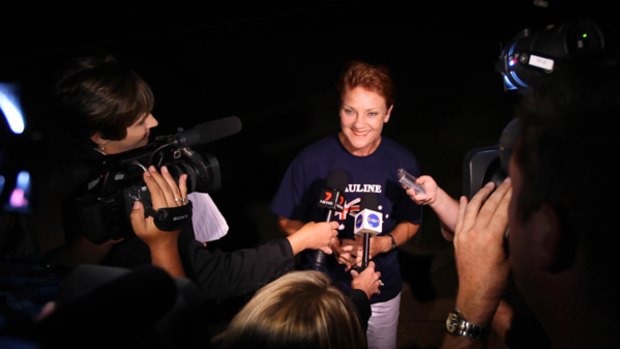 Independant candidate for the Queensland State seat of Beaudesert Pauline Hanson arrives to a media pack at the Royal Hotel in Roadvale.