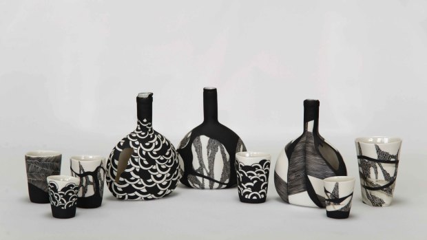 Maria Chatzinikolaki - porcelain bottles and beakers with underglazes and glazes
