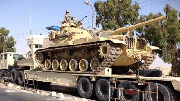 An Egyptian military tank is deployed in the northern Sinai. With an insurgency threatening its sensitive border with Israel, Egypt's military is preparing to go on the offensive against Sinai militants.