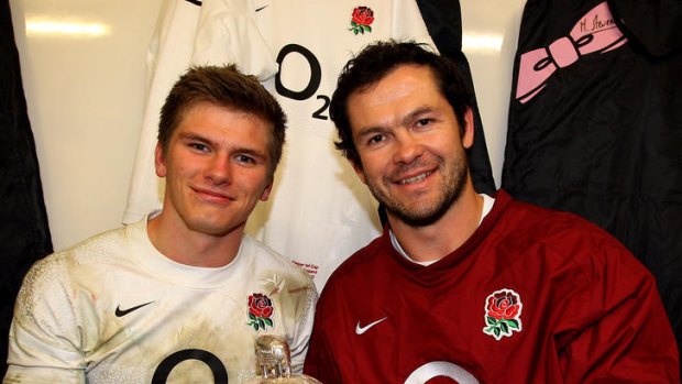 England centre Owen Farrell and his father and assistant England coach coach Andy, pose with the Calcutta Cup.