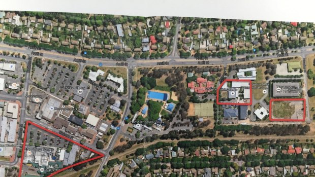 Land owned by Tradies in Dickson shops including the carpark the club bought from the government, at left, and the two blocks behind the pool which the government bought from the Tradies, including the CFMEU headquarters. 