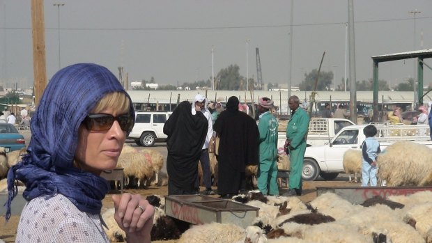 White at a sheep market in Kuwait.