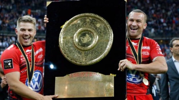 Winners are grinners: Drew Mitchell (L) and Matt Giteau will line-up for the World XV after winning the Heineken Cup and Top 14 titles in the past two weeks.
