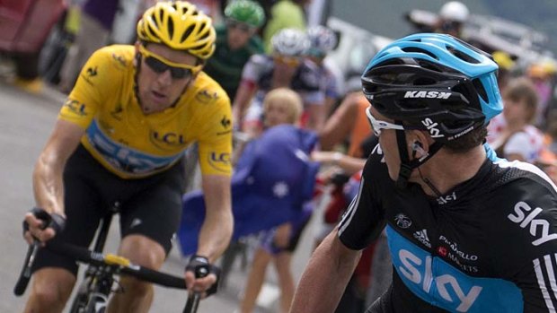 Bradley Wiggins behind teammate Chris Froome during the 17th stage of last year's race.