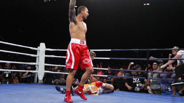 Mindset: Cooper celebrates after knocking out Barry Dunnett during a cruiserweight fight earlier this year at the Brisbane Entertainment Centre.