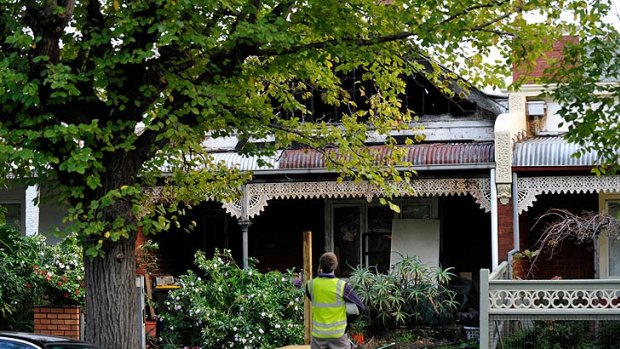 The terrace house in North Fitzroy has been extensively damaged by fire this morning