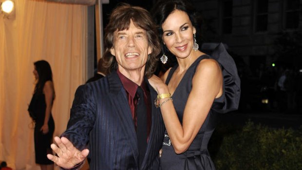 The Rolling Stones singer Mick Jagger, left, and girlfriend L'Wren Scott in 2012.