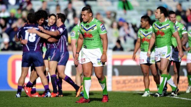 Worlds apart... The Melbourne Storm and Canberra Raiders.