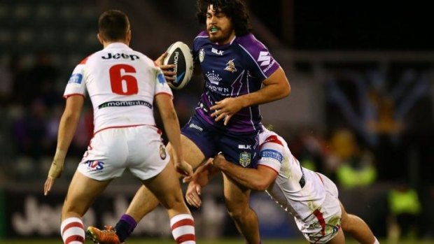 Tohu Harris attempts to break a tackle.