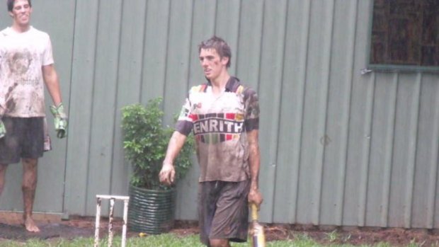 Backyard star ... Pat Cummins playing cricket with his family.