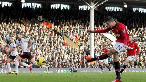 Robin van Persie scores Manchester United's second goal against Fulham.